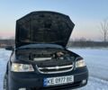 Черный Шевроле Лачетти, объемом двигателя 1.8 л и пробегом 241 тыс. км за 4100 $, фото 2 на Automoto.ua
