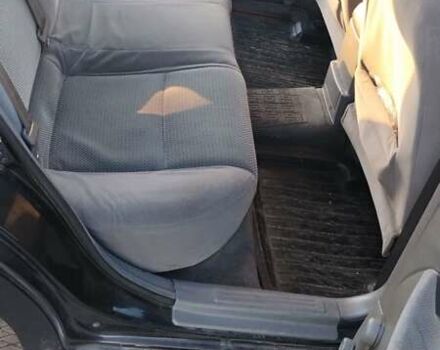 Черный Шевроле Лачетти, объемом двигателя 1.8 л и пробегом 210 тыс. км за 3800 $, фото 12 на Automoto.ua