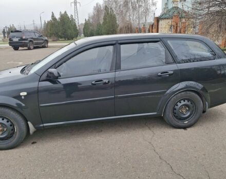 Черный Шевроле Лачетти, объемом двигателя 1.8 л и пробегом 335 тыс. км за 4000 $, фото 1 на Automoto.ua