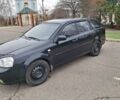 Черный Шевроле Лачетти, объемом двигателя 1.8 л и пробегом 335 тыс. км за 4000 $, фото 1 на Automoto.ua