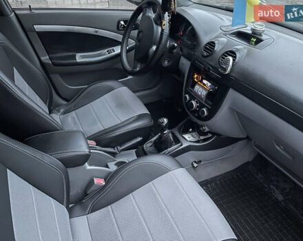 Чорний Шевроле Лачетті, об'ємом двигуна 1.8 л та пробігом 285 тис. км за 3999 $, фото 13 на Automoto.ua