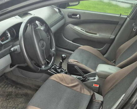 Черный Шевроле Лачетти, объемом двигателя 1.8 л и пробегом 280 тыс. км за 3899 $, фото 5 на Automoto.ua