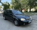 Чорний Шевроле Лачетті, об'ємом двигуна 1.8 л та пробігом 209 тис. км за 2000 $, фото 1 на Automoto.ua