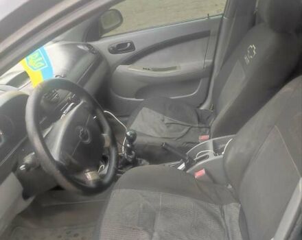 Черный Шевроле Лачетти, объемом двигателя 1.6 л и пробегом 370 тыс. км за 3500 $, фото 2 на Automoto.ua