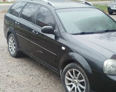 Черный Шевроле Лачетти, объемом двигателя 1.8 л и пробегом 300 тыс. км за 3800 $, фото 1 на Automoto.ua