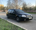 Черный Шевроле Лачетти, объемом двигателя 1.8 л и пробегом 231 тыс. км за 4950 $, фото 1 на Automoto.ua