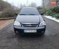 Черный Шевроле Лачетти, объемом двигателя 1.8 л и пробегом 200 тыс. км за 3900 $, фото 1 на Automoto.ua