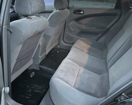 Черный Шевроле Лачетти, объемом двигателя 1.8 л и пробегом 180 тыс. км за 3900 $, фото 16 на Automoto.ua