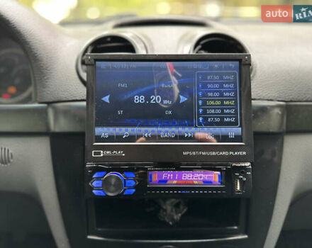 Черный Шевроле Лачетти, объемом двигателя 1.8 л и пробегом 280 тыс. км за 3299 $, фото 12 на Automoto.ua