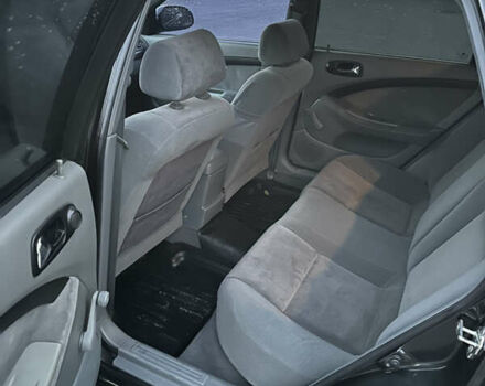 Черный Шевроле Лачетти, объемом двигателя 1.8 л и пробегом 180 тыс. км за 3900 $, фото 12 на Automoto.ua