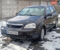 Чорний Шевроле Лачетті, об'ємом двигуна 1.8 л та пробігом 298 тис. км за 3000 $, фото 1 на Automoto.ua