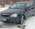 Черный Шевроле Лачетти, объемом двигателя 1.8 л и пробегом 298 тыс. км за 3000 $, фото 1 на Automoto.ua