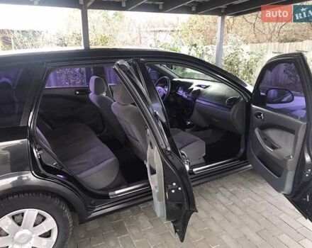 Черный Шевроле Лачетти, объемом двигателя 1.8 л и пробегом 348 тыс. км за 4400 $, фото 6 на Automoto.ua