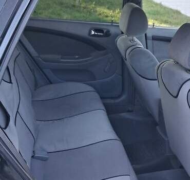 Черный Шевроле Лачетти, объемом двигателя 1.8 л и пробегом 112 тыс. км за 6500 $, фото 10 на Automoto.ua