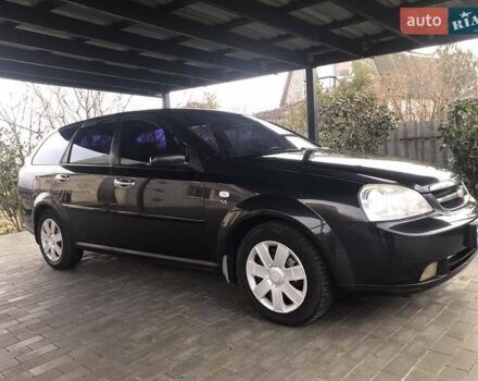 Черный Шевроле Лачетти, объемом двигателя 1.8 л и пробегом 348 тыс. км за 4400 $, фото 1 на Automoto.ua