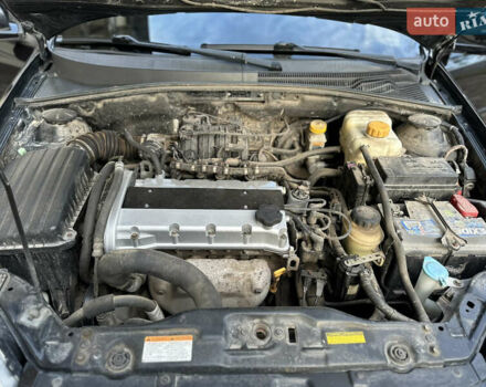 Черный Шевроле Лачетти, объемом двигателя 1.6 л и пробегом 230 тыс. км за 4950 $, фото 119 на Automoto.ua