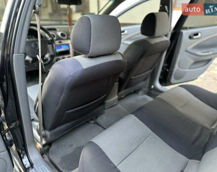 Черный Шевроле Лачетти, объемом двигателя 1.6 л и пробегом 230 тыс. км за 4950 $, фото 108 на Automoto.ua