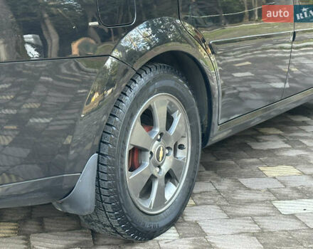 Черный Шевроле Лачетти, объемом двигателя 1.6 л и пробегом 230 тыс. км за 4950 $, фото 50 на Automoto.ua