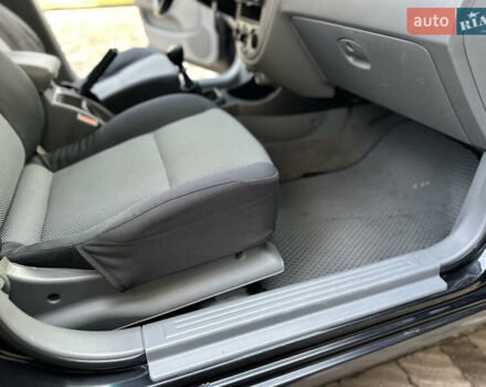 Черный Шевроле Лачетти, объемом двигателя 1.6 л и пробегом 230 тыс. км за 4950 $, фото 86 на Automoto.ua