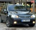 Черный Шевроле Лачетти, объемом двигателя 1.6 л и пробегом 230 тыс. км за 4950 $, фото 1 на Automoto.ua