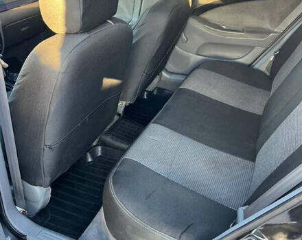 Черный Шевроле Лачетти, объемом двигателя 1.8 л и пробегом 210 тыс. км за 6150 $, фото 13 на Automoto.ua