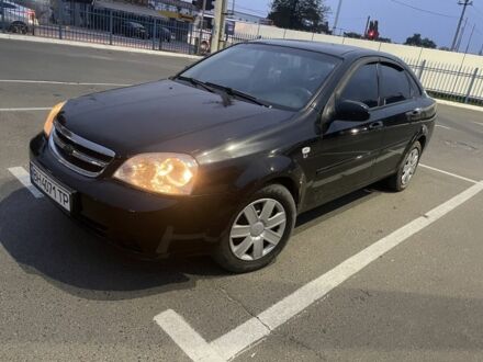 Черный Шевроле Лачетти, объемом двигателя 1.8 л и пробегом 280 тыс. км за 4200 $, фото 1 на Automoto.ua