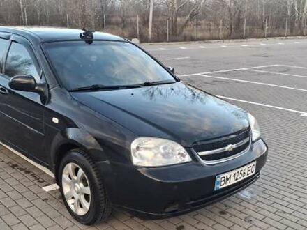 Черный Шевроле Лачетти, объемом двигателя 1.8 л и пробегом 240 тыс. км за 3000 $, фото 1 на Automoto.ua