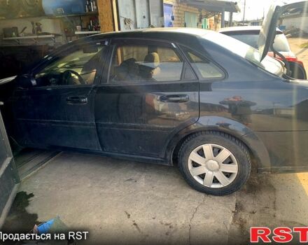 Черный Шевроле Лачетти, объемом двигателя 1.6 л и пробегом 200 тыс. км за 3888 $, фото 1 на Automoto.ua