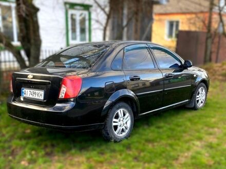 Черный Шевроле Лачетти, объемом двигателя 1.6 л и пробегом 340 тыс. км за 2400 $, фото 1 на Automoto.ua