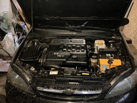 Черный Шевроле Лачетти, объемом двигателя 1.6 л и пробегом 280 тыс. км за 1537 $, фото 1 на Automoto.ua