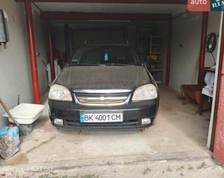 Черный Шевроле Лачетти, объемом двигателя 1.8 л и пробегом 182 тыс. км за 3700 $, фото 1 на Automoto.ua