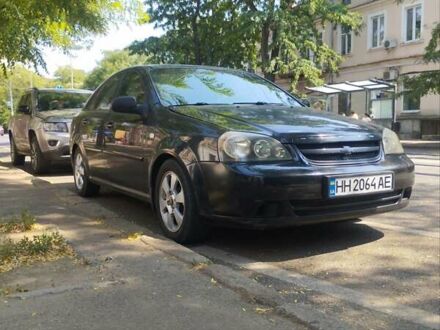 Черный Шевроле Лачетти, объемом двигателя 1.6 л и пробегом 400 тыс. км за 4000 $, фото 1 на Automoto.ua