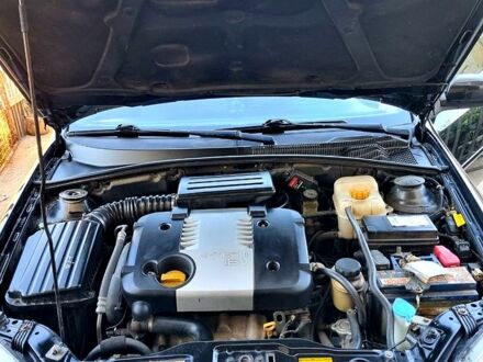 Черный Шевроле Лачетти, объемом двигателя 1.8 л и пробегом 281 тыс. км за 4200 $, фото 1 на Automoto.ua