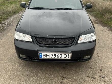 Черный Шевроле Лачетти, объемом двигателя 1.6 л и пробегом 300 тыс. км за 3300 $, фото 1 на Automoto.ua