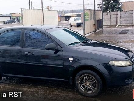 Черный Шевроле Лачетти, объемом двигателя 1.6 л и пробегом 390 тыс. км за 4200 $, фото 1 на Automoto.ua