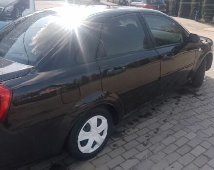 Черный Шевроле Лачетти, объемом двигателя 1.8 л и пробегом 235 тыс. км за 3400 $, фото 1 на Automoto.ua