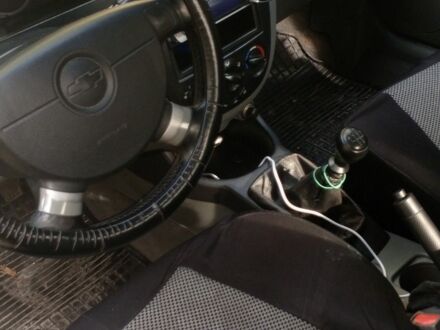 Черный Шевроле Лачетти, объемом двигателя 1.8 л и пробегом 294 тыс. км за 4000 $, фото 1 на Automoto.ua