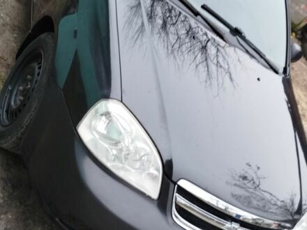 Черный Шевроле Лачетти, объемом двигателя 1.6 л и пробегом 270 тыс. км за 3350 $, фото 1 на Automoto.ua