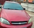 Красный Шевроле Лачетти, объемом двигателя 1.4 л и пробегом 219 тыс. км за 2600 $, фото 1 на Automoto.ua