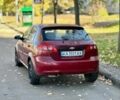 Красный Шевроле Лачетти, объемом двигателя 1.6 л и пробегом 300 тыс. км за 2350 $, фото 4 на Automoto.ua