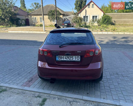 Красный Шевроле Лачетти, объемом двигателя 1.8 л и пробегом 180 тыс. км за 3500 $, фото 3 на Automoto.ua