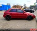 Красный Шевроле Лачетти, объемом двигателя 16 л и пробегом 250 тыс. км за 2300 $, фото 5 на Automoto.ua