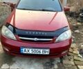 Красный Шевроле Лачетти, объемом двигателя 1.8 л и пробегом 244 тыс. км за 3800 $, фото 1 на Automoto.ua