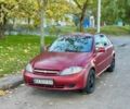 Красный Шевроле Лачетти, объемом двигателя 1.6 л и пробегом 300 тыс. км за 2350 $, фото 1 на Automoto.ua