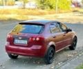 Красный Шевроле Лачетти, объемом двигателя 1.6 л и пробегом 300 тыс. км за 2350 $, фото 3 на Automoto.ua