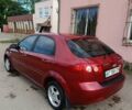 Красный Шевроле Лачетти, объемом двигателя 1.4 л и пробегом 252 тыс. км за 4000 $, фото 7 на Automoto.ua