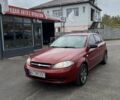 Красный Шевроле Лачетти, объемом двигателя 1.4 л и пробегом 160 тыс. км за 4450 $, фото 1 на Automoto.ua