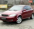 Красный Шевроле Лачетти, объемом двигателя 1.6 л и пробегом 184 тыс. км за 5499 $, фото 2 на Automoto.ua