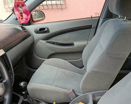 Красный Шевроле Лачетти, объемом двигателя 1.4 л и пробегом 252 тыс. км за 4000 $, фото 9 на Automoto.ua