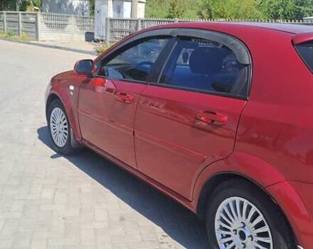 Красный Шевроле Лачетти, объемом двигателя 1.8 л и пробегом 280 тыс. км за 5700 $, фото 2 на Automoto.ua